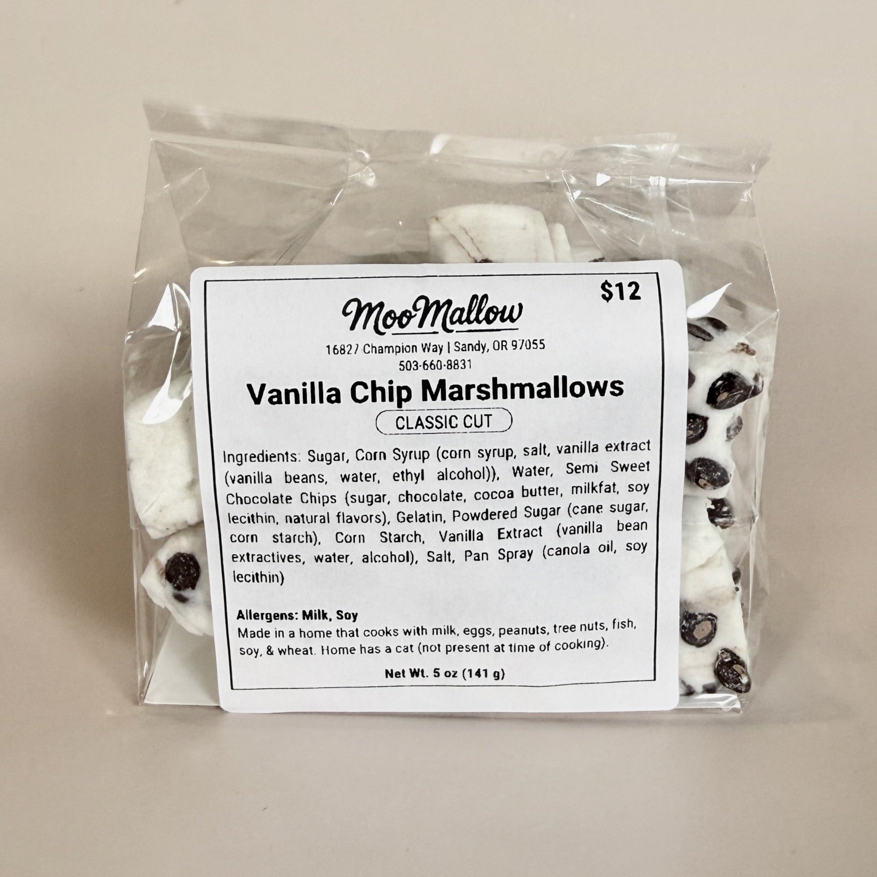 Packaged vanilla chip marshmallows with a label on a beige background