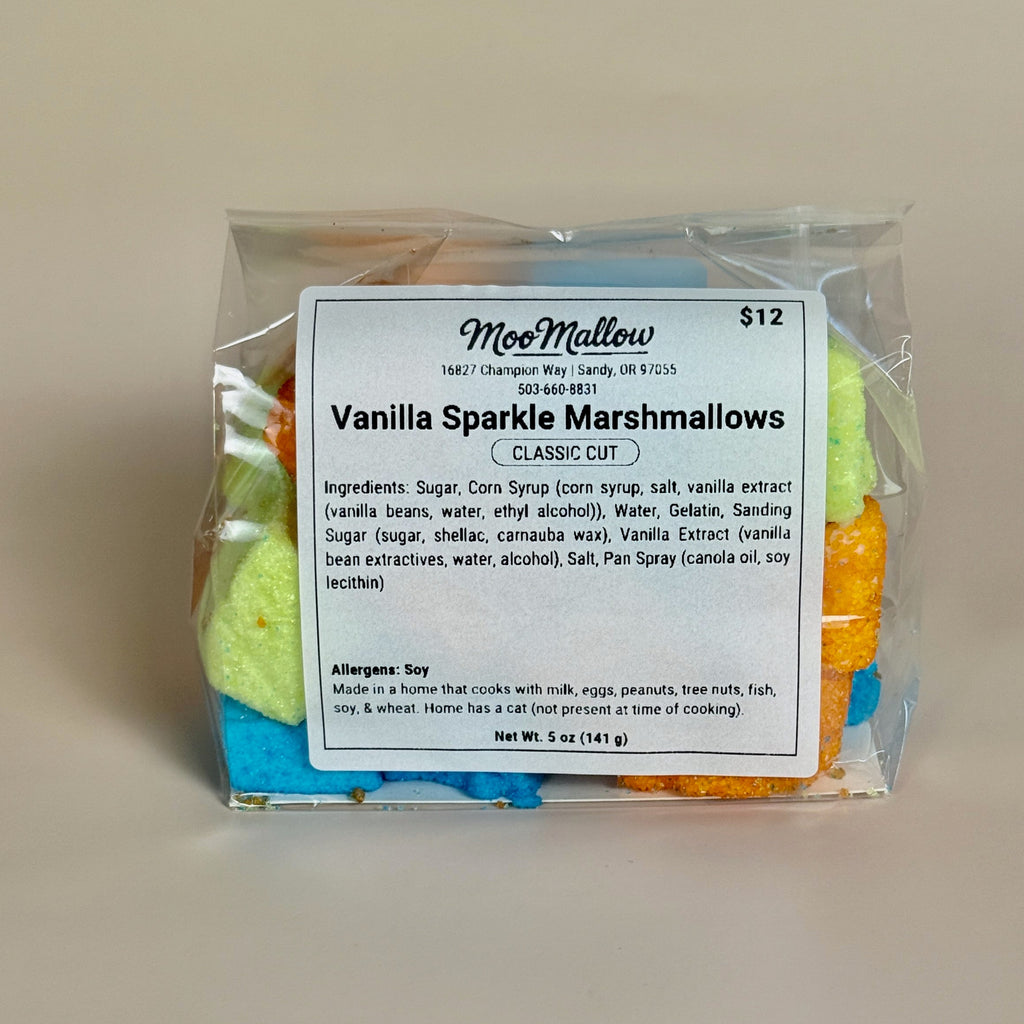 Packaged Vanilla Sparkle Marshmallows with a label on a beige background