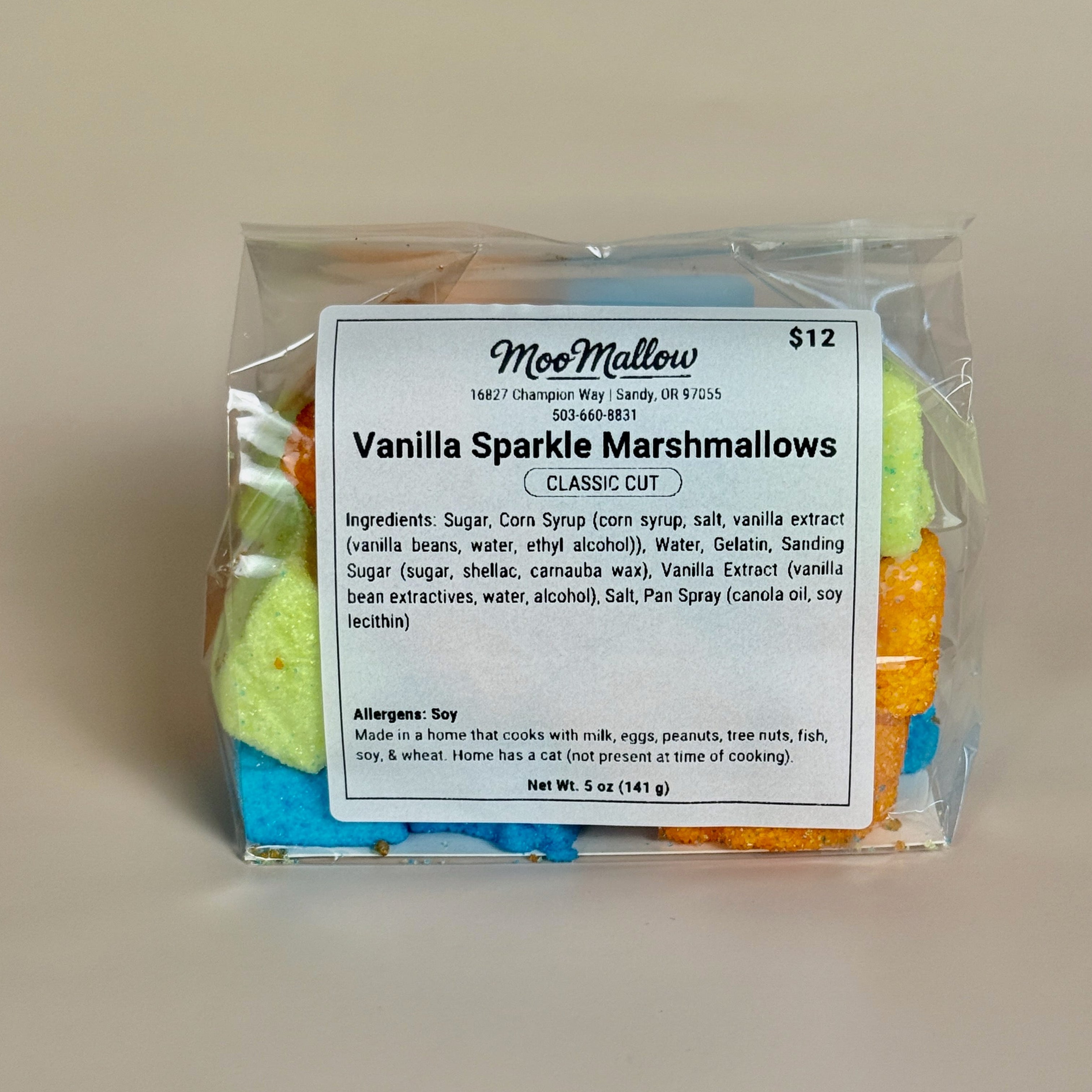 Packaged Vanilla Sparkle Marshmallows with a label on a beige background