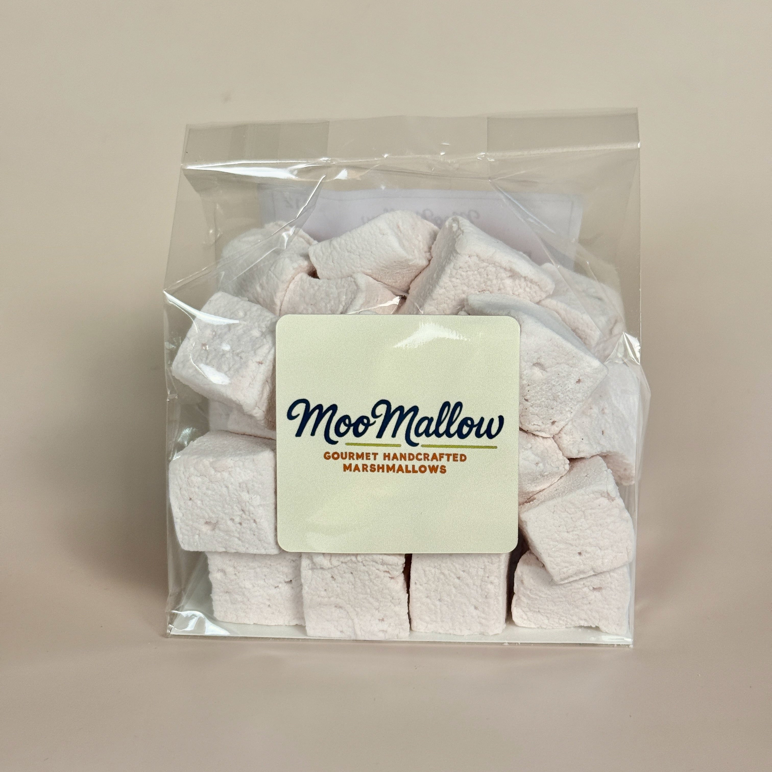 Packaged marshmallows with a 'MooMallow' label on a beige background