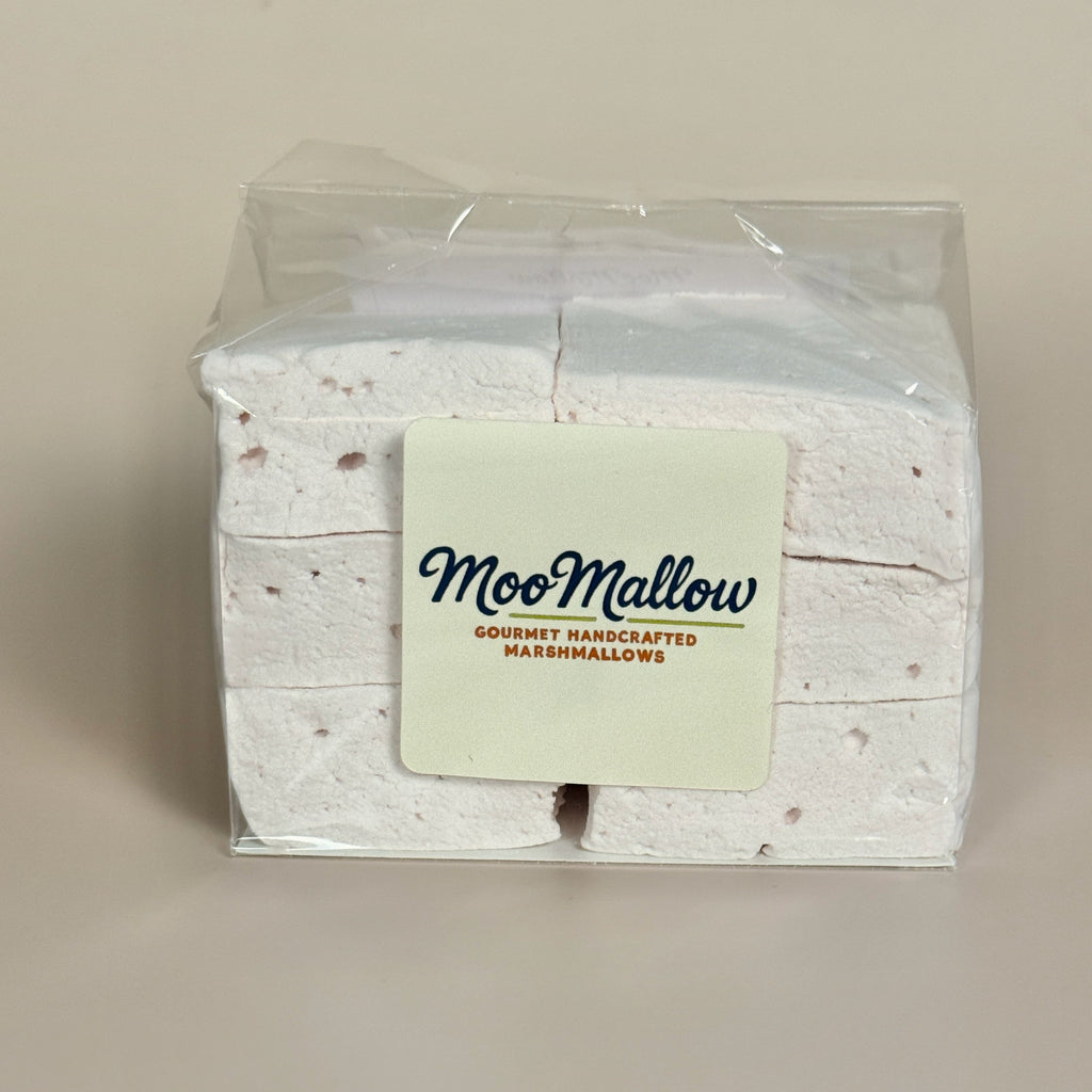 Packaged marshmallows with a 'Moo Mallow' label on a beige background